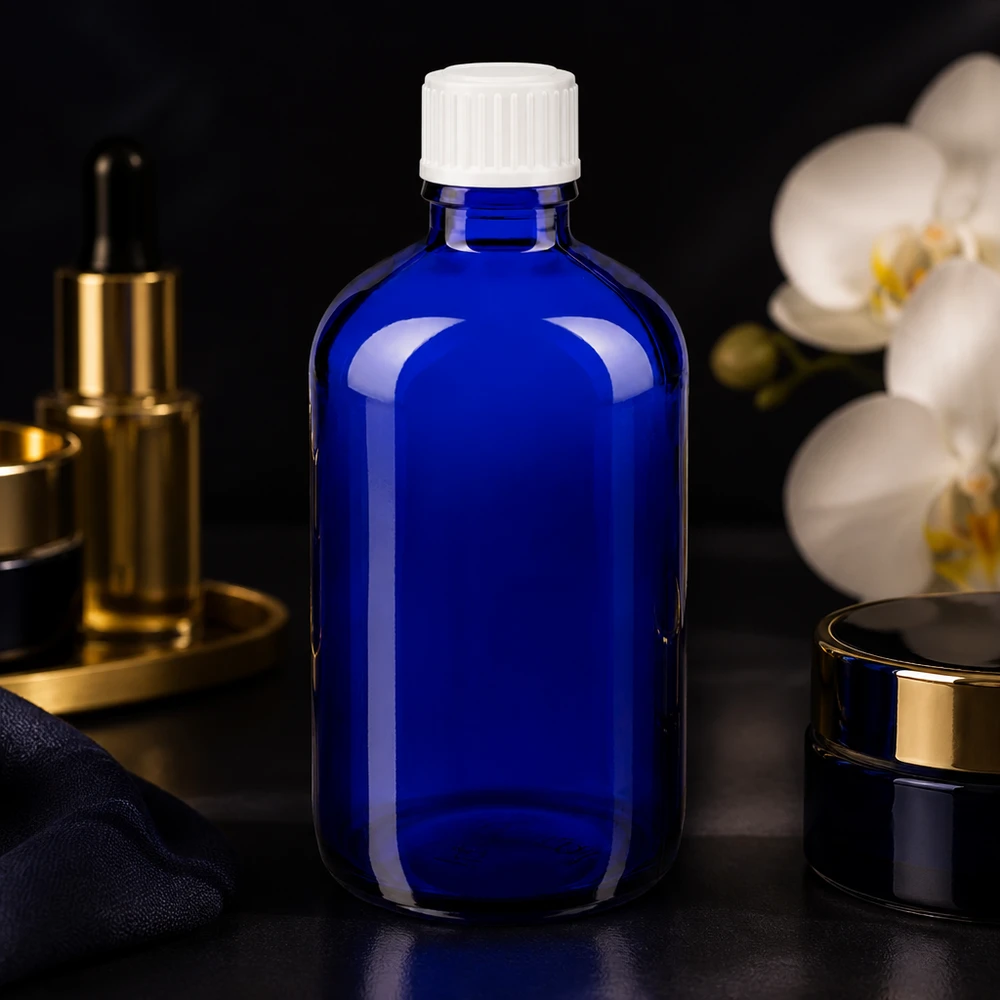 Lékárenská láhev modrá 100ml šroubovací uzávěr bílý globule standardní Kleine blaue Apothekerflasche 100ml Glas mit weißem Schraubdeckel lichtgeschützt
