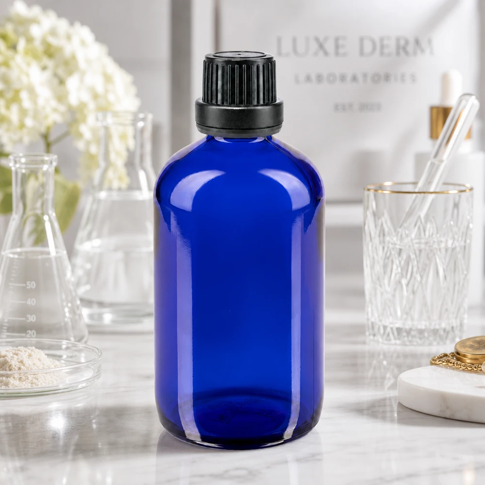 Lékárenská láhev modrá 100ml šroubovací uzávěr černý tamper evident uzávěr. Lichtgeschützte blaue Apothekerflasche 100ml ideal für Kosmetik Seren und ätherische Öle