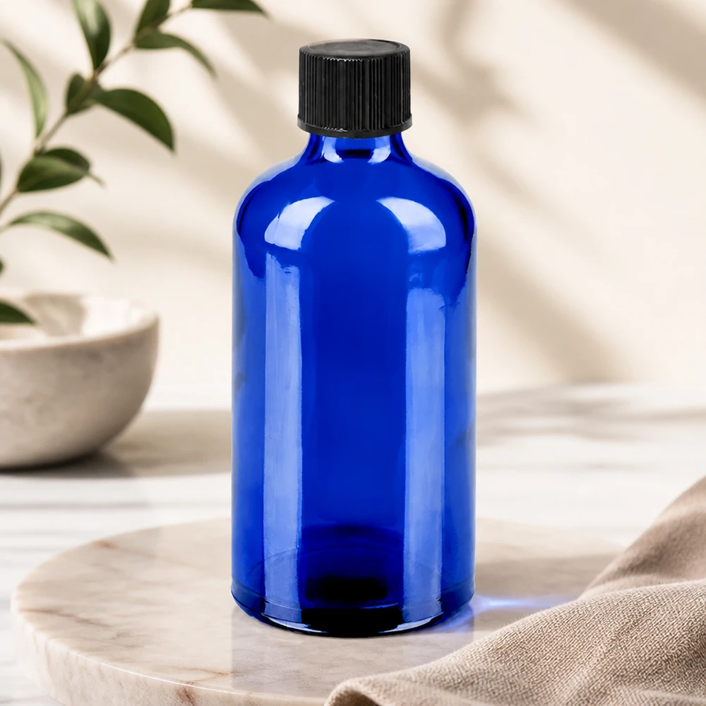 100ml lahvička s kapátkem 1mm černá standardní uzávěr BlueLine UT18/100 Stilvolle blaue Glasflasche 100ml mit tropfgenauer Abgabe für Naturkosmetik und Heilpflanzenextrakte