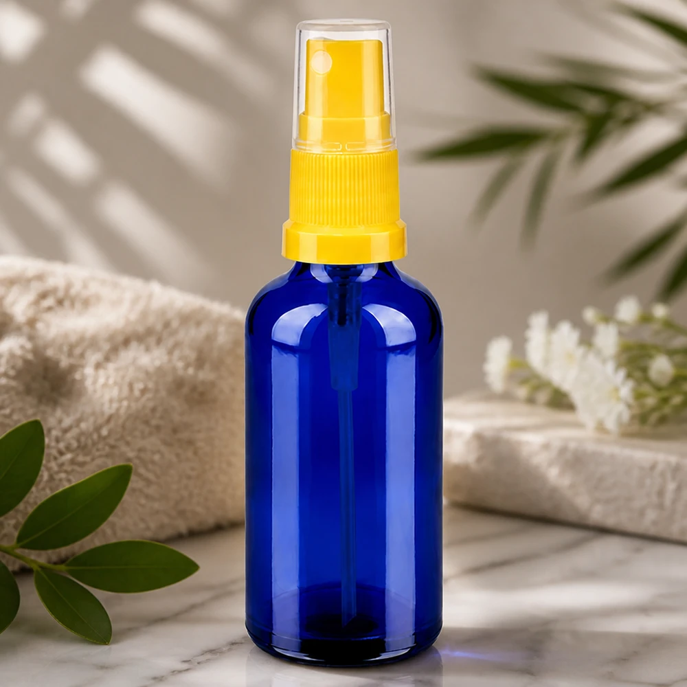 50ml lahvička s rozprašovačem žlutá/transparentní standardní uzávěr BlueLine UT18/50 Lichtgeschützte 50ml Sprayflasche in Apothekerqualität für empfindliche Naturkosmetik und Öle